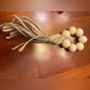 Four homemade beautiful needed napkin holders with tassels